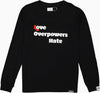 love overpowers hate long sleeve tee